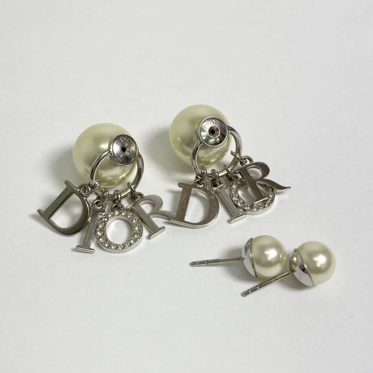 DIOR logo silver triballes resin pearl earrings