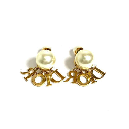 DIOR logo gold Tribales resin pearl earrings