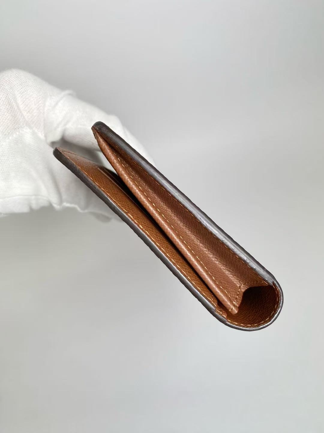 LOUIS VUITTON Monogram Bi-fold Long Wallet M66540