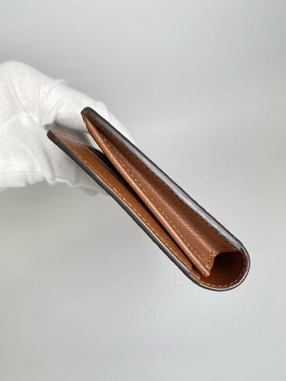 LOUIS VUITTON Monogram Bi-fold Long Wallet M66540